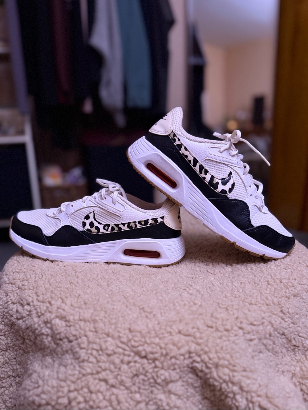 Nike Women’s White and Black Athletic Sneakers with Leopard Swoosh